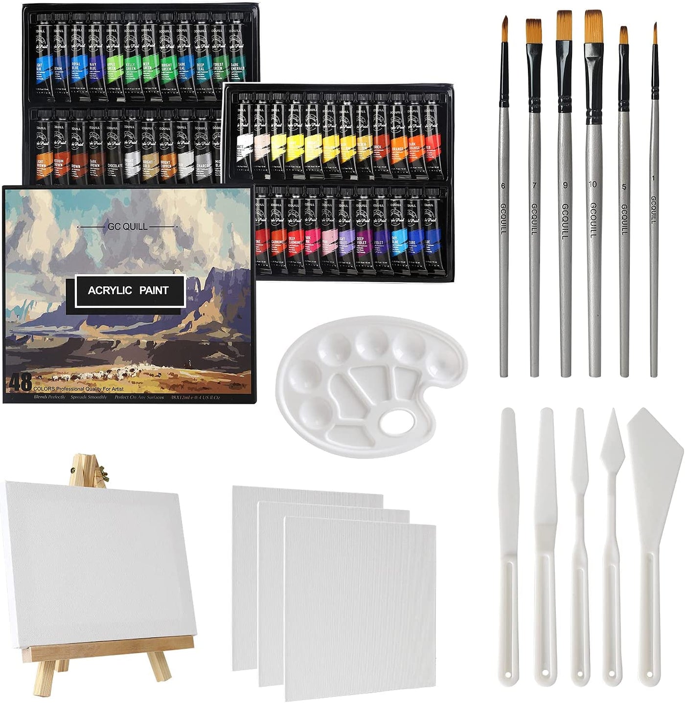 Artist paintbrushes, paint tubes and small easel with canvas